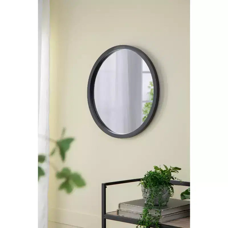 Miroir mural rond avec cadre en bois noir