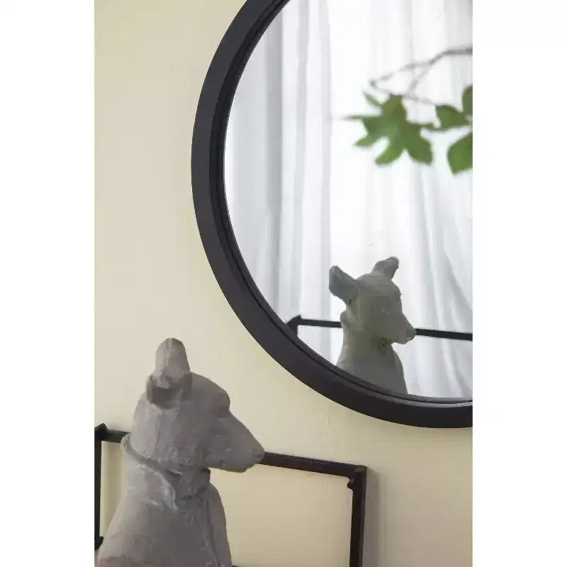 Miroir mural rond avec cadre en bois noir