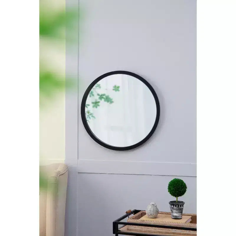 Miroir mural rond avec cadre en bois noir