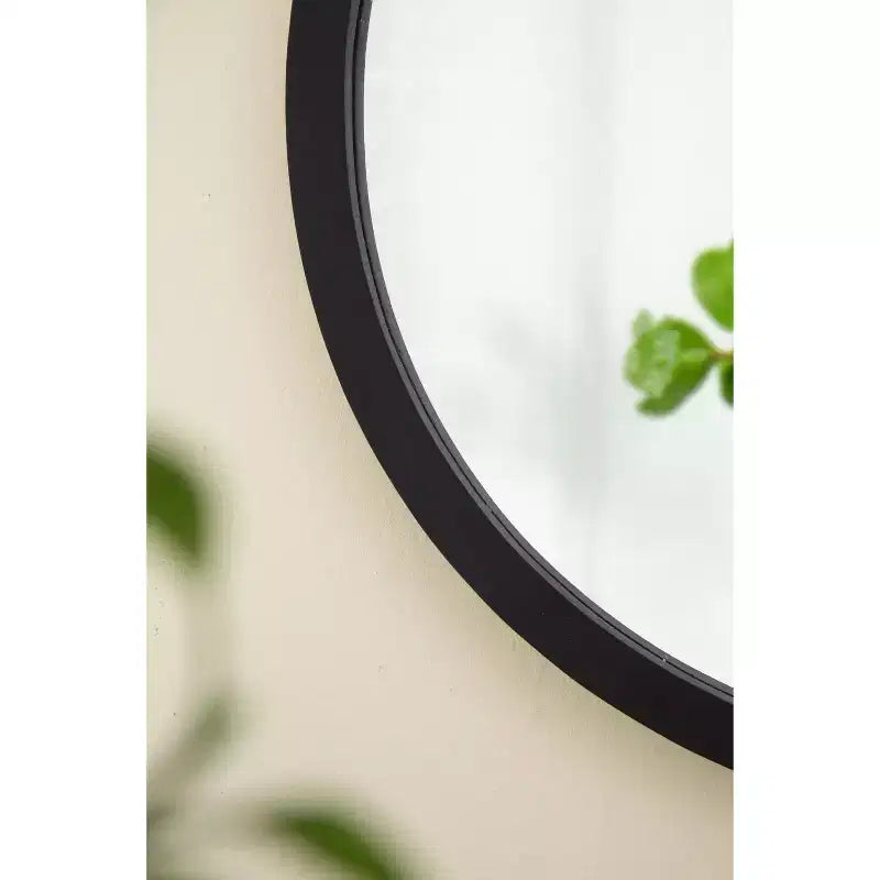 Miroir mural rond avec cadre en bois noir