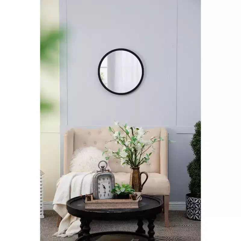 Miroir mural rond avec cadre en bois noir